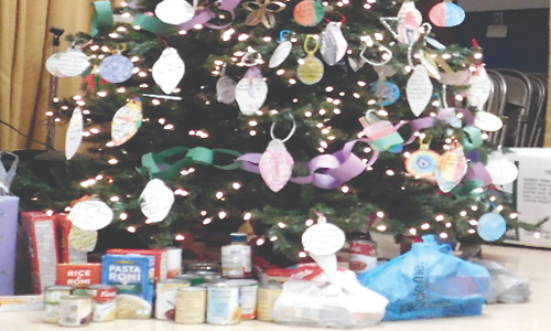 Holiday Food Drive items and tree