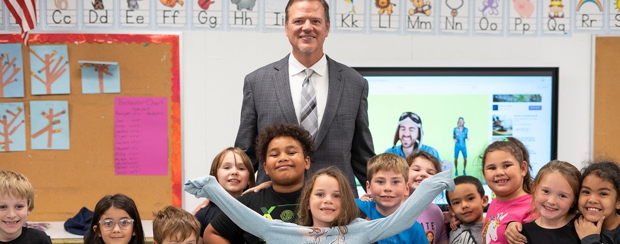 Superintendent with students (10/2022)